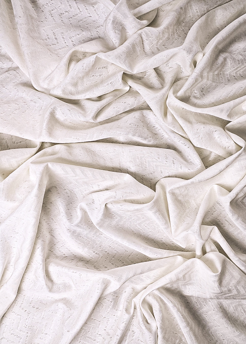 White Dyeable Cotton Fabric With All Over Self Work 10011