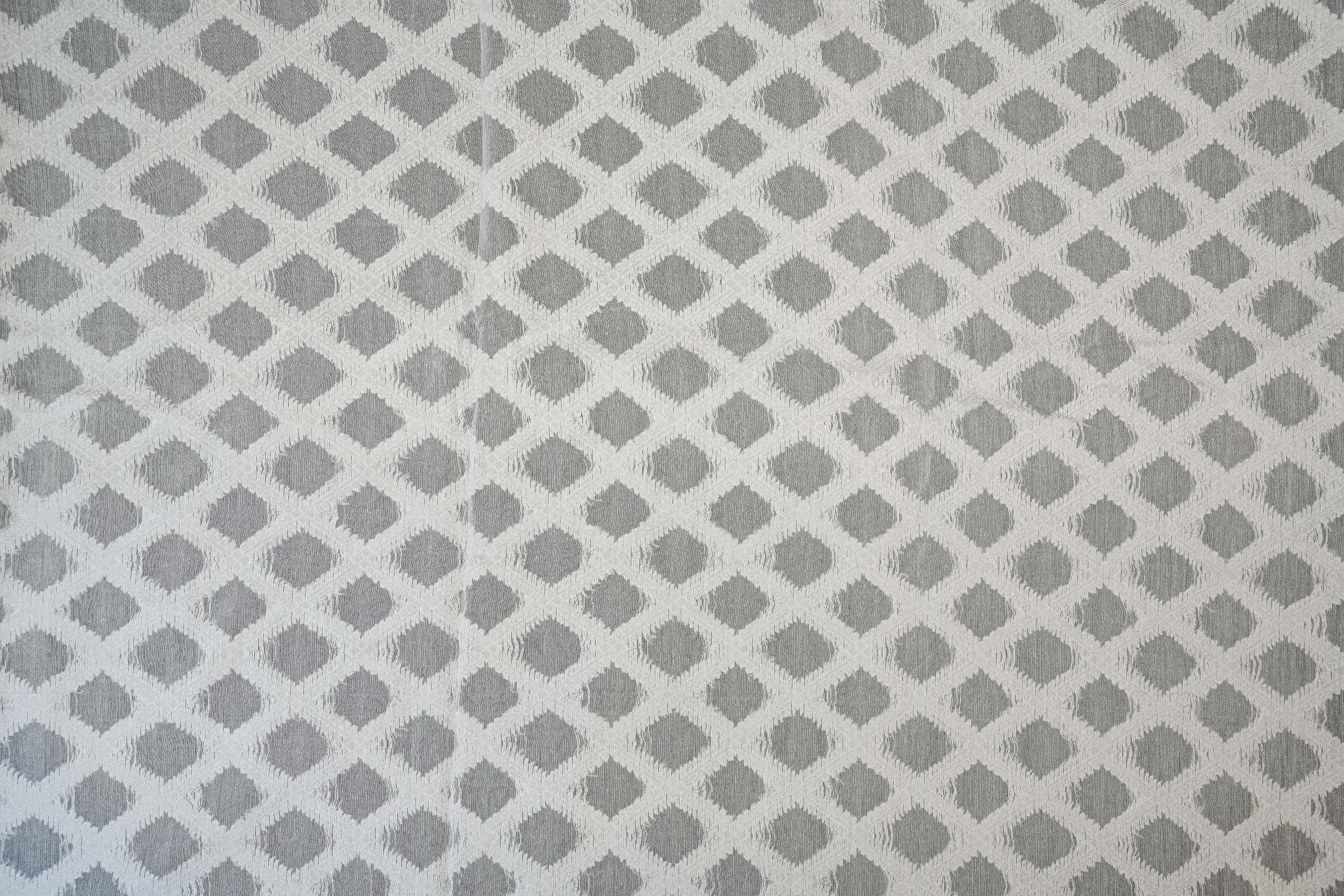 White Dyeable Cotton Fabric With All Over Self Work 10016