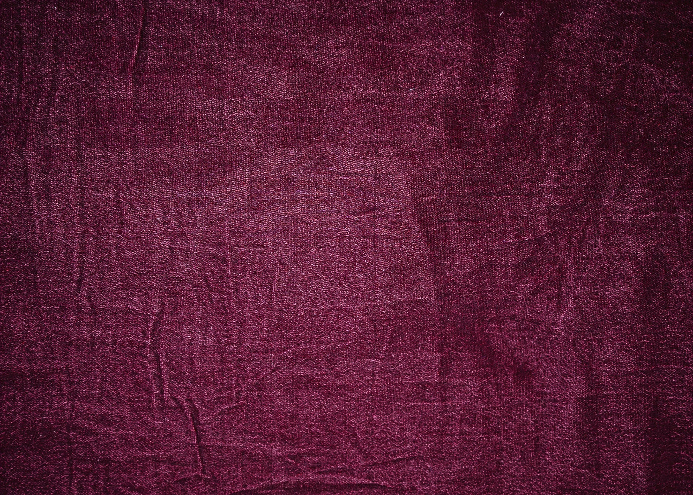 Solid purple velvet fabric perfect for creating elegant and luxurious fashion designs - Paras Gallery Fabrics