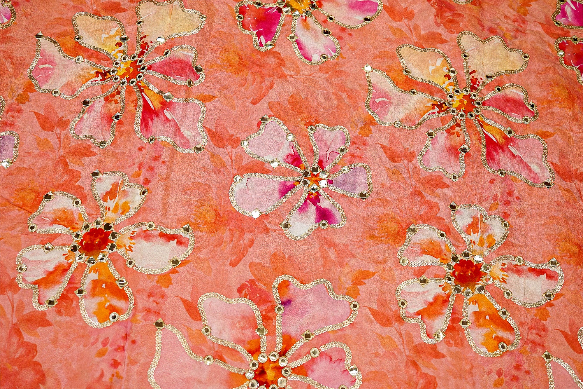 Elegant peach floral crepe featuring zari, faux mirror, and sequin details - Paras Gallery Fabrics