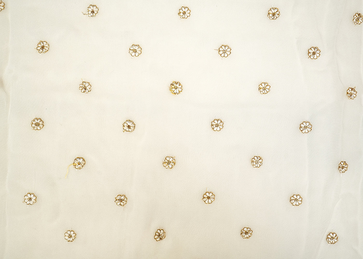 Dyeable Georgette Fabric with All-Over Floral Buti of White Threadwork and Golden Sequins