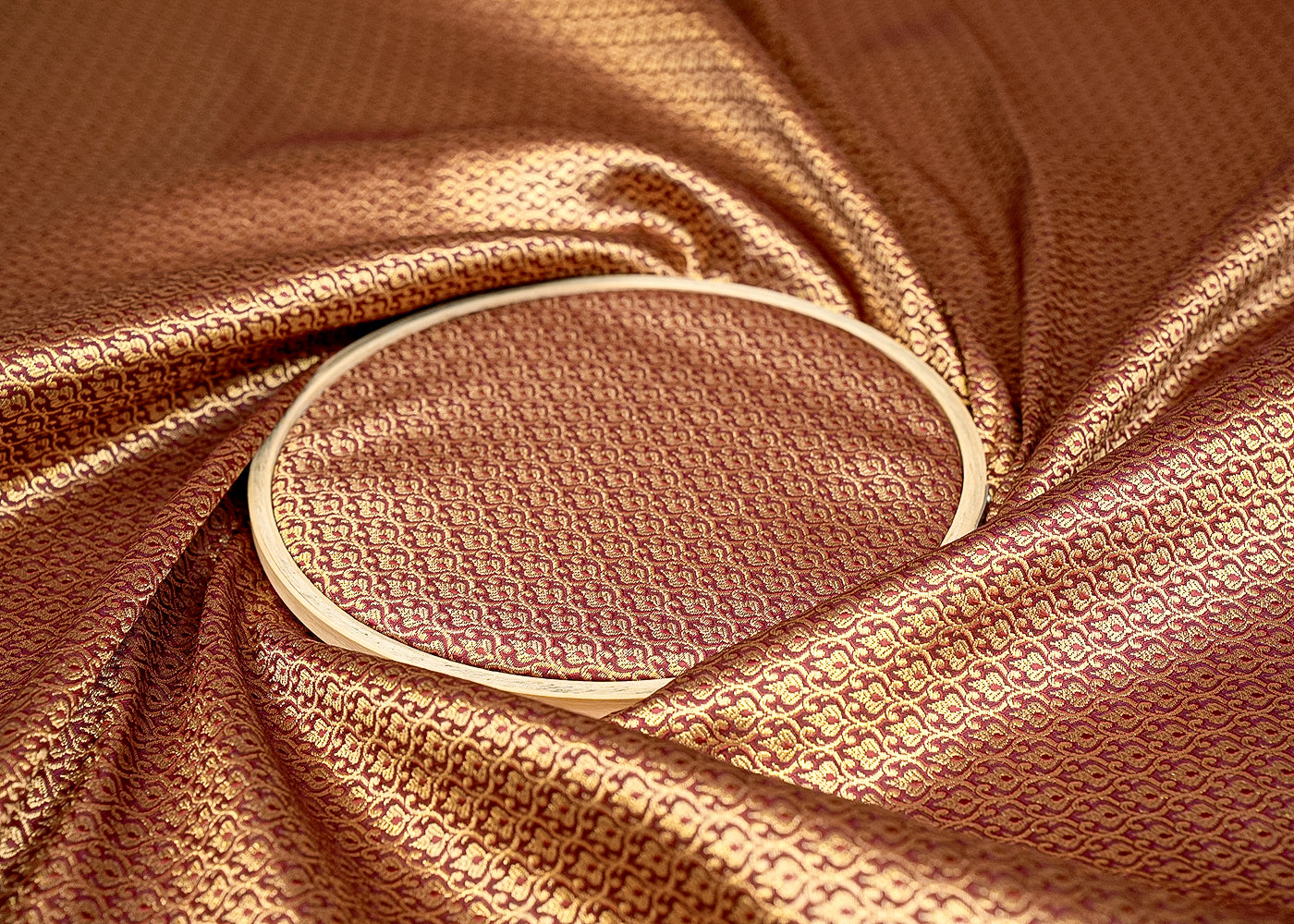 Deep Maroon Banarasi Silk Fabric with All-Over Golden Traditional Handloom