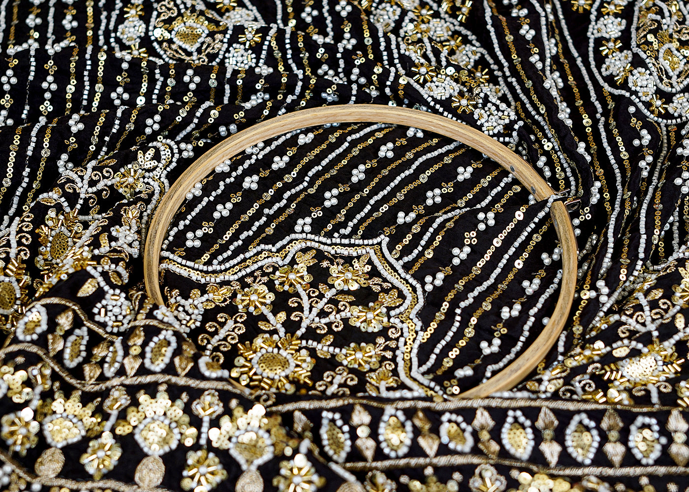 Black Crepe Fabric with All-Over Buti and Border of Sequins, Kutdana, Pearl, and Zari Work
