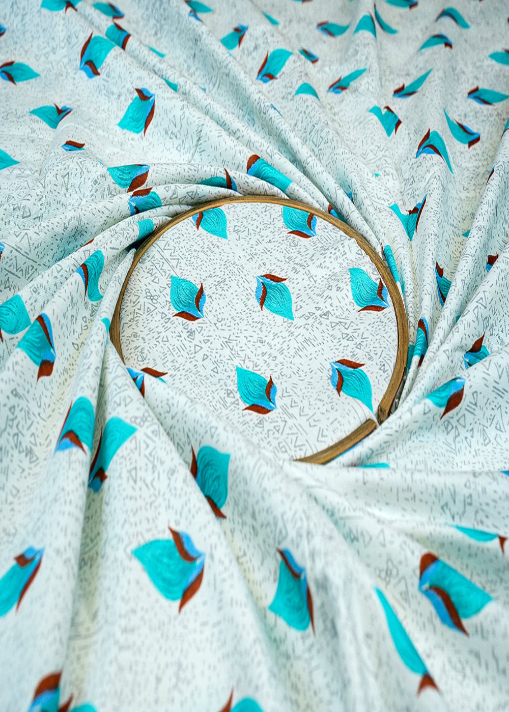 Sea-Blue-Cotton-Flex-Fabric-With-Allover-Base-Print-And-Small-Flowers-12744-close-view