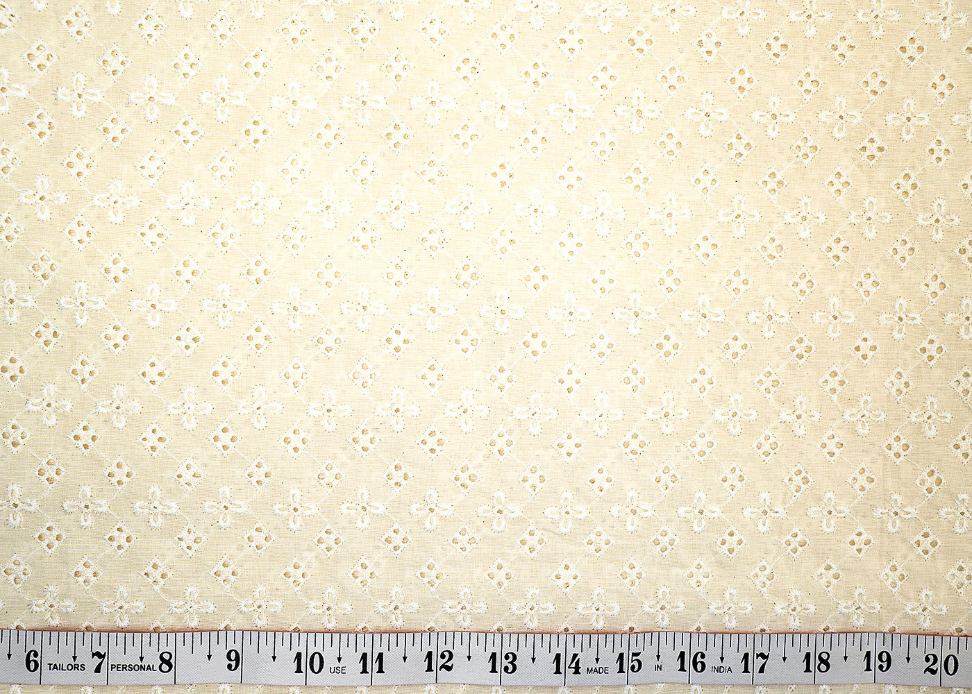 White Cotton Dobby Fabric with Allover Thread Work 13524