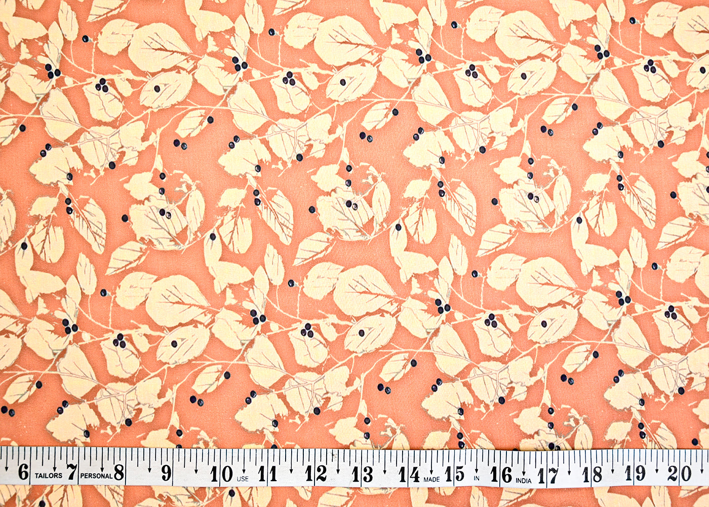 Dark Peach Muslin Fabric with Allover Leaves Print 14053