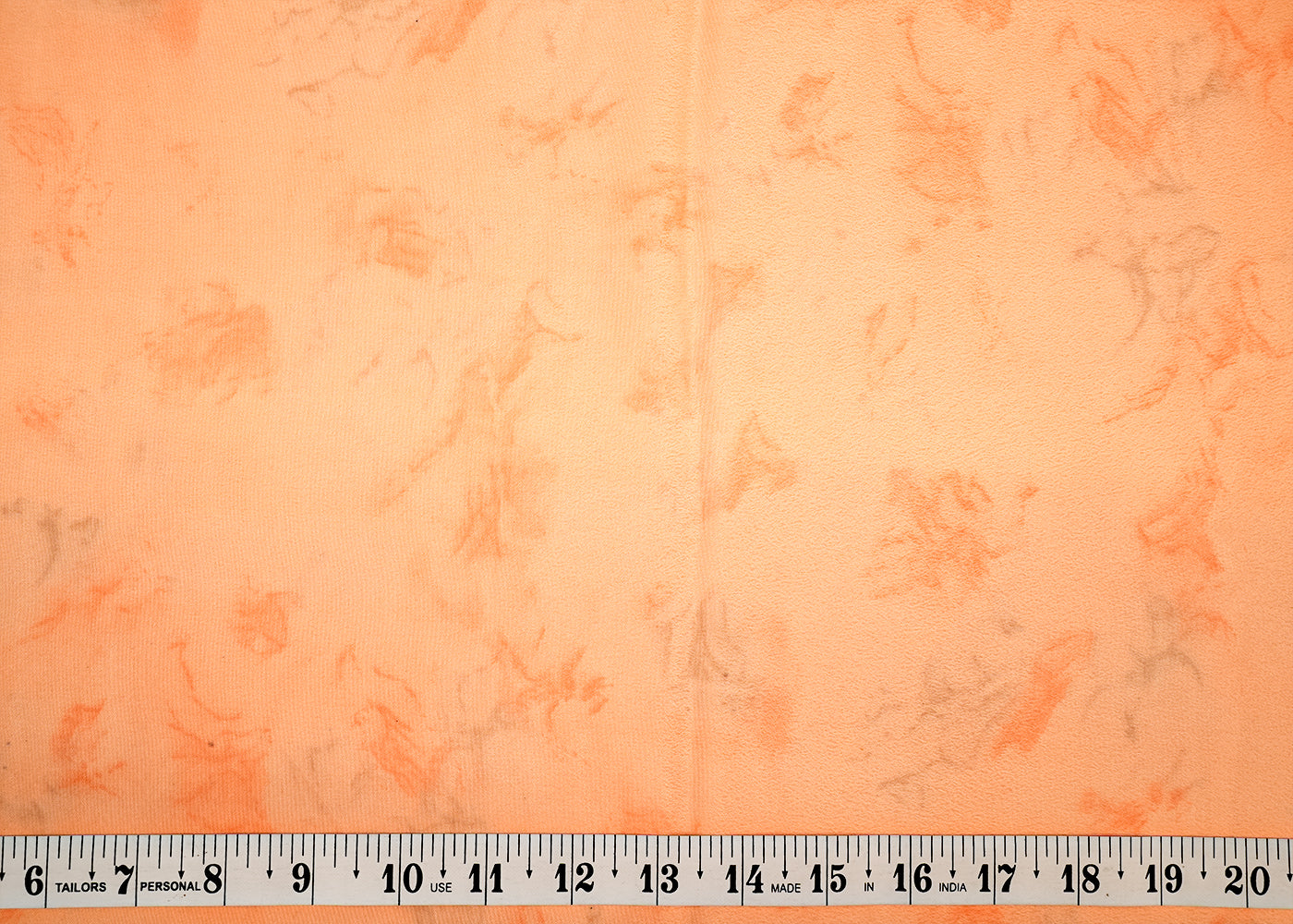 Peach Crepe Fabric with Allover Self Print 14601