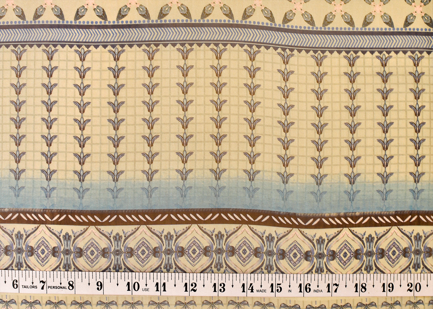 Sky Blue Organza Fabric with All Over Traditional Print and One Side Border 14632