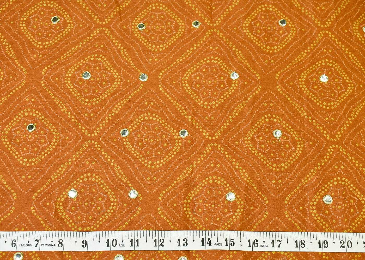 Rust Chinon Chiffon Fabric with All Over Bandhani Print and Faux Mirror Work 15163