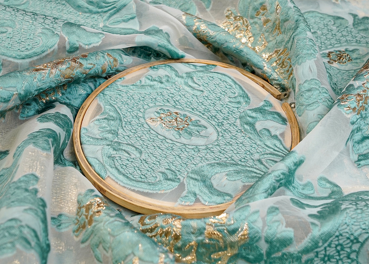 Teal Faux Organza Fabric with All-Over Embossed Work 15248