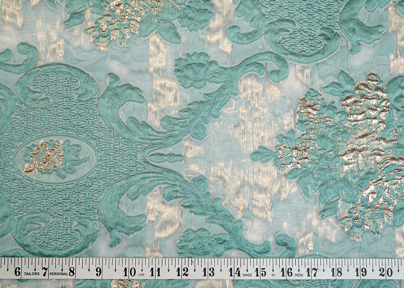 Teal Faux Organza Fabric with All-Over Embossed Work 15248