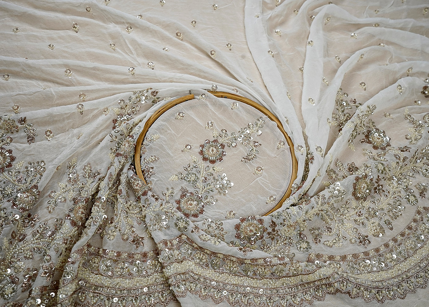 Dyeable Georgette white Fabric with All-Over Zari, Sequins, and Bead Work with One-Side Heavy Border 15842