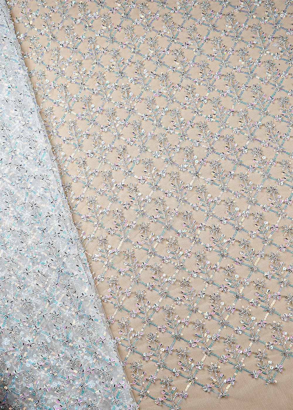 White Imported Net Fabric With All Over Ranibow Sequins And Katdana Work 16033