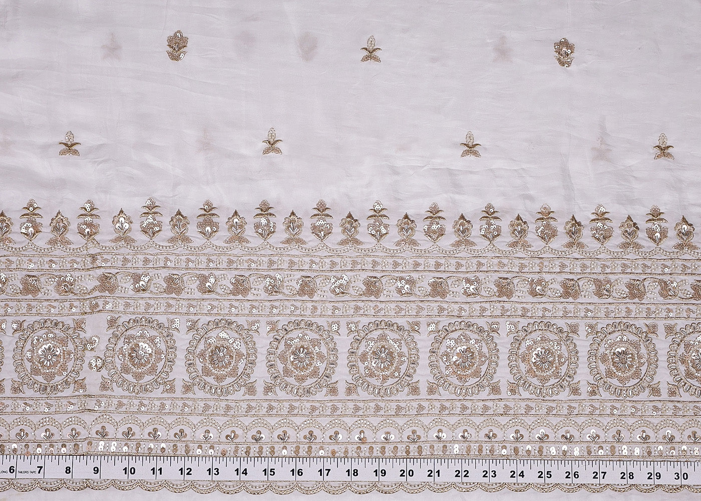 White Crepe Fabric With All Over Buti Of Katdana, Zari, Sequins And One Side Heavy Border 16401