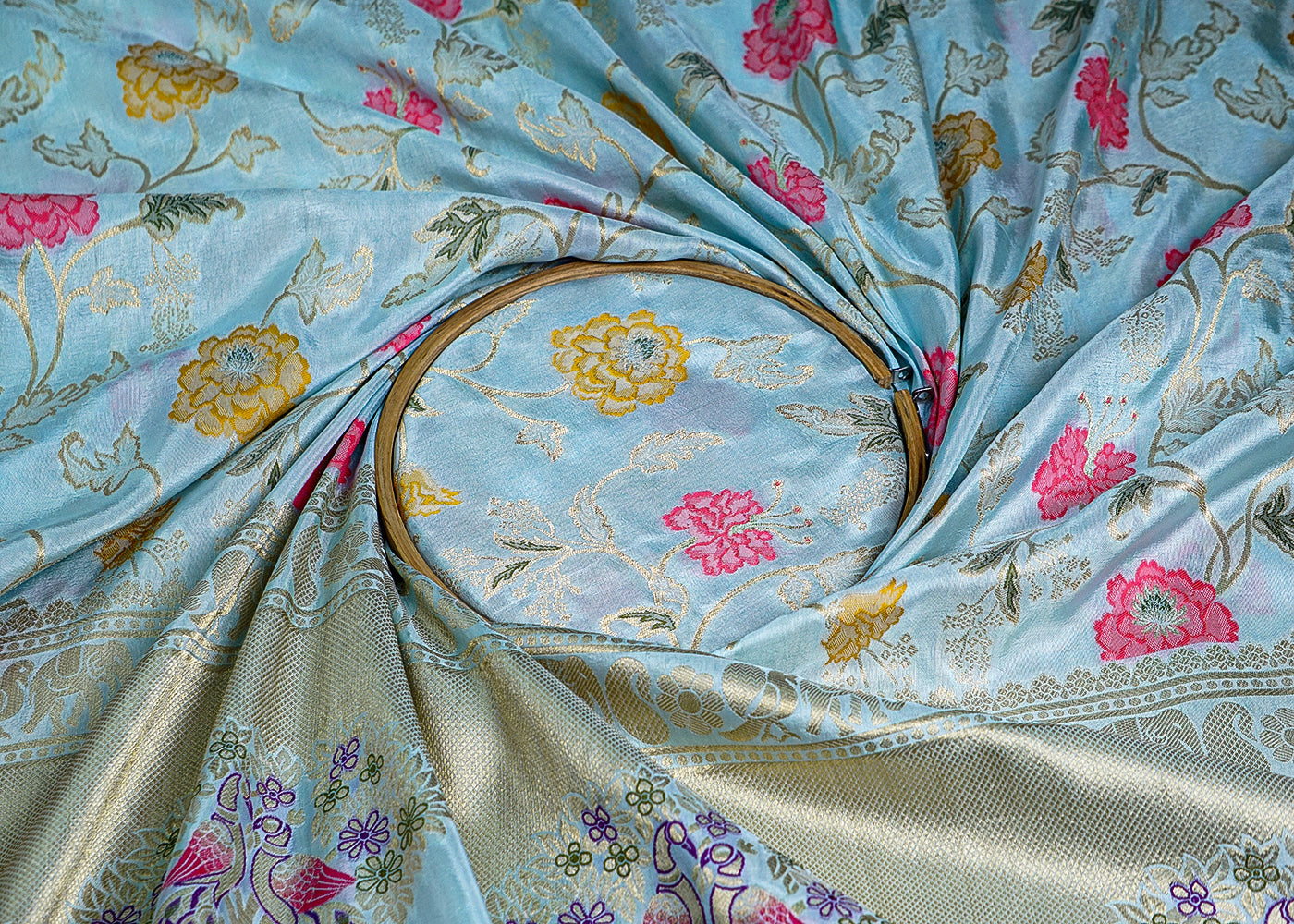 Ice Blue Upada Silk Fabric With All Over Floral Print And Zari Work With One Side Heavy Border 16419