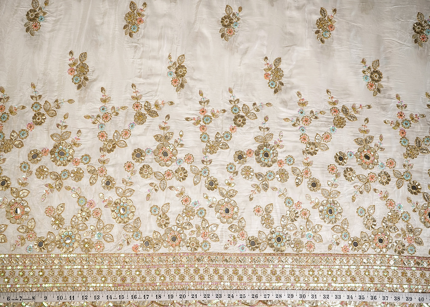 White Crepe Fabric With All Over Zari, Sequins, Katdana, Faux Mirror And Bead Work With One Side Heavy Border 16482