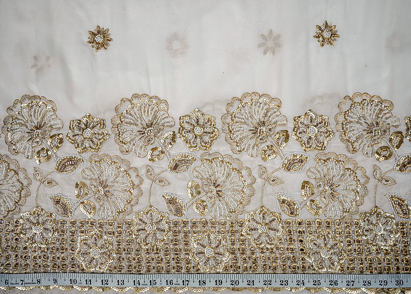 White Georgette Fabric With All Over Zari, Sequins And Bead Work With One Side Cutwork Border 16537