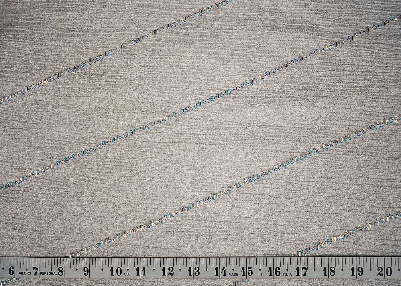 Silver Crushed Tissue Fabric With All Over Diagonal Stripes Of Katdana, Bead And Sequins Work 16541