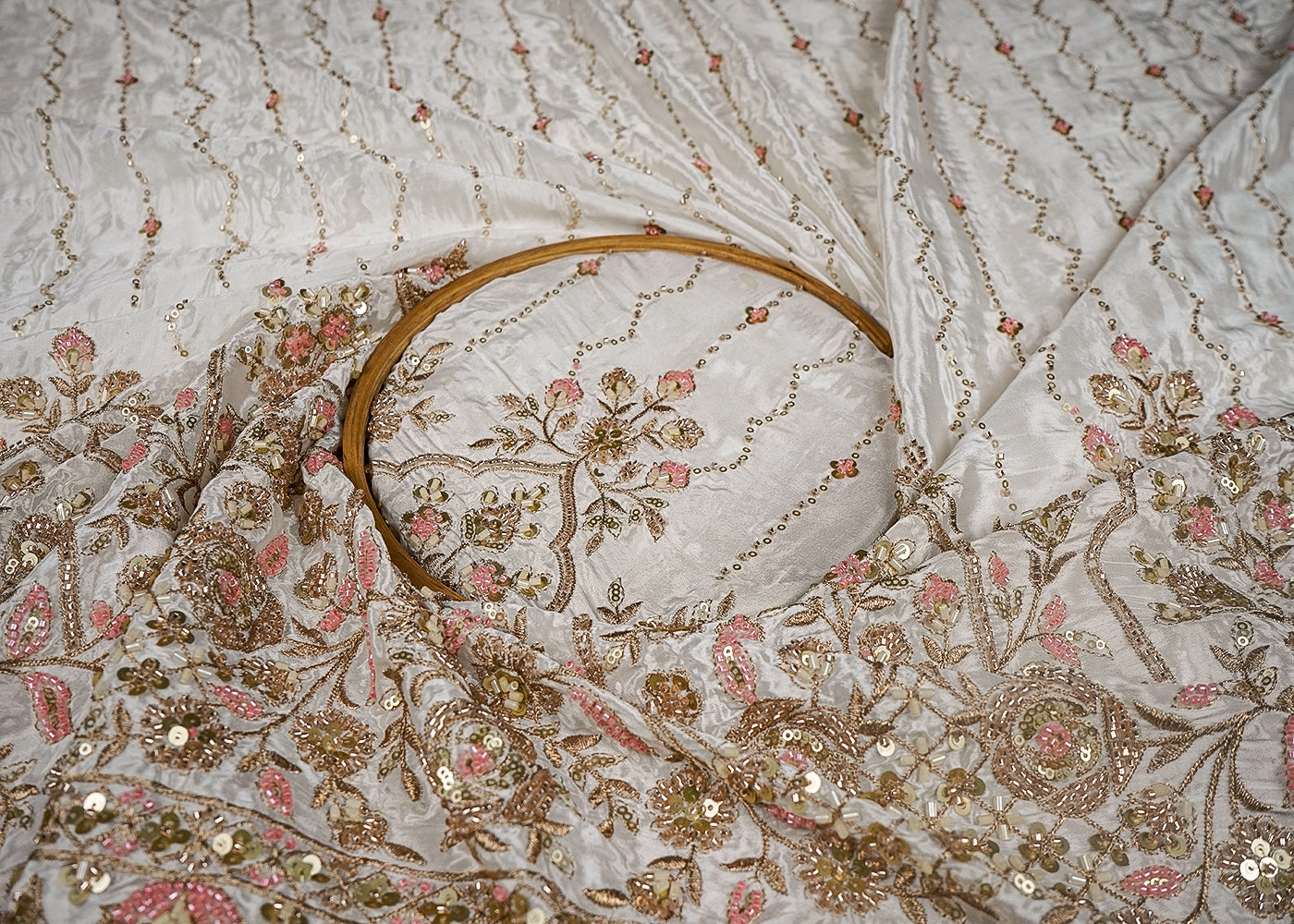 White Dyeable Crepe Fabric With All Over Sequins, Bead And Zari Work With One Side Heavy Border 16623