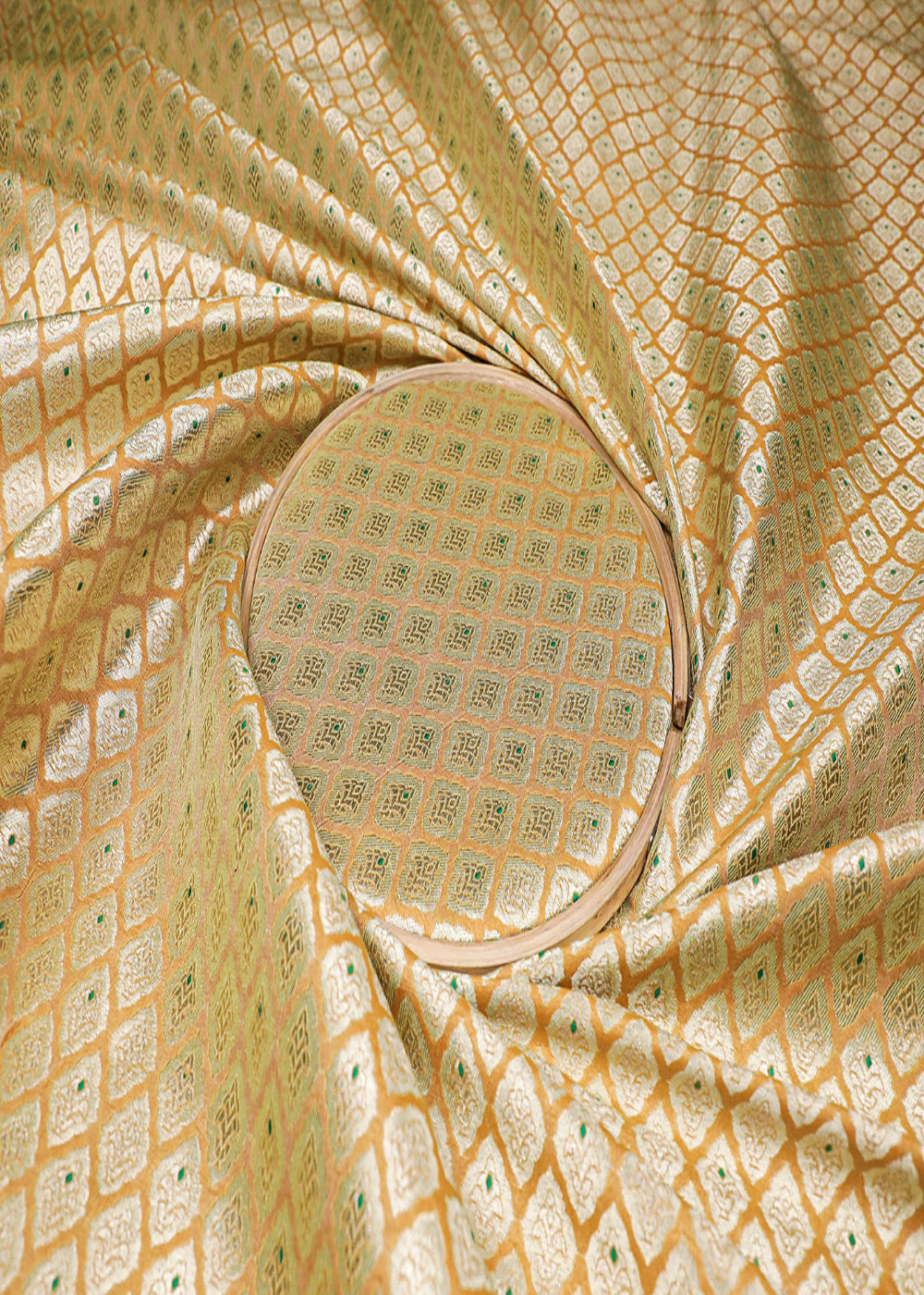 mustard-banarasi-brocade-fabric-with-all-over-golden-zari-and-thread-handloom-16780-close-view