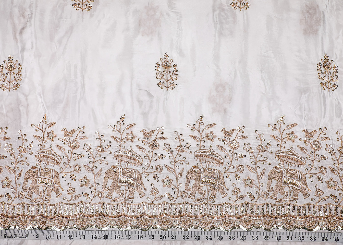 White Crepe Fabric With All Over Zari, Bead, Katdana And Sequins Work With One Side Elephant Motif Border 19183