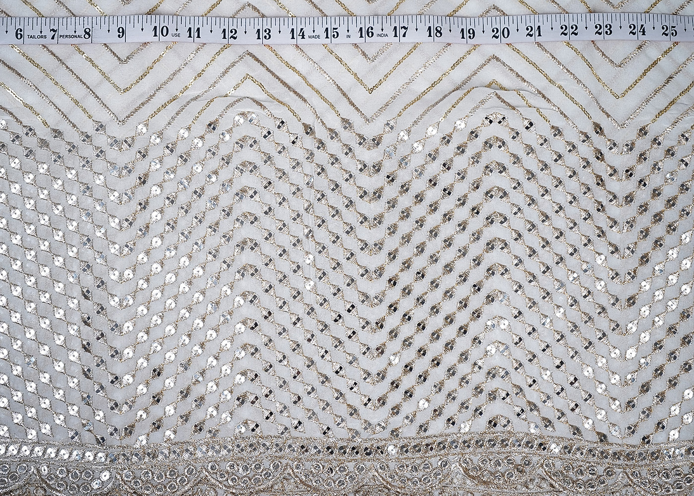 White Georgette Fabric With All Over Zari And Sequins Work With One Side Border 19198