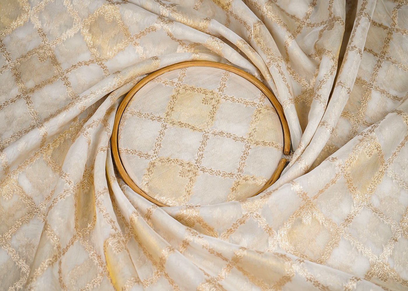 White Organza Tissue Fabric with Allover Golden Zari Jaal Pattern Handloom 19621