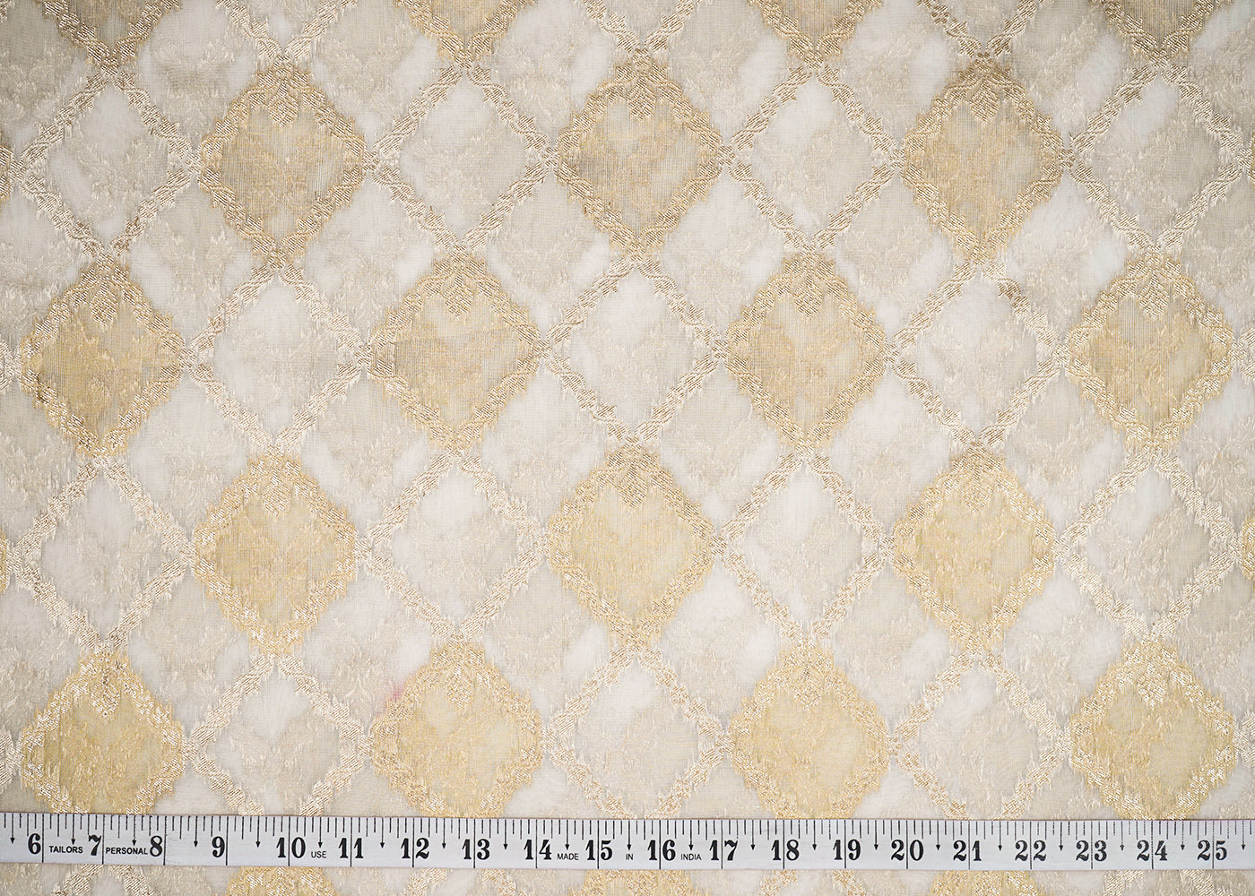 White Organza Tissue Fabric with Allover Golden Zari Jaal Pattern Handloom 19621