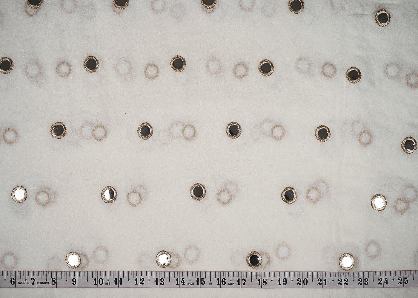 White Georgette Fabric with Allover Golden Zari and Faux Mirror Work 19688