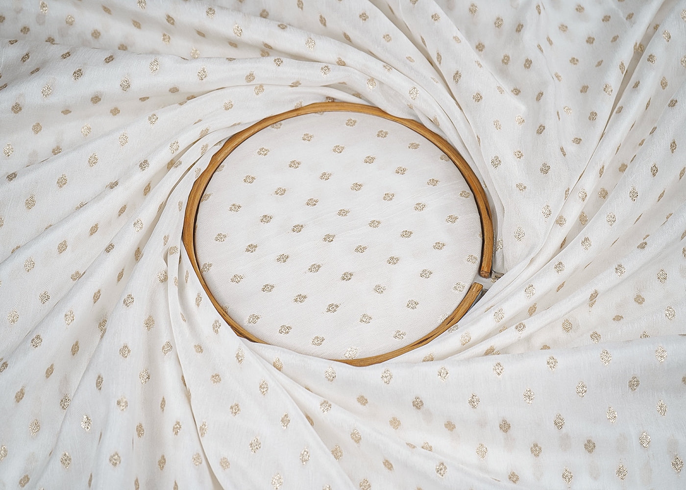 White Upada Silk Fabric with Allover Golden Zari Handloom and One-Side Border 19709