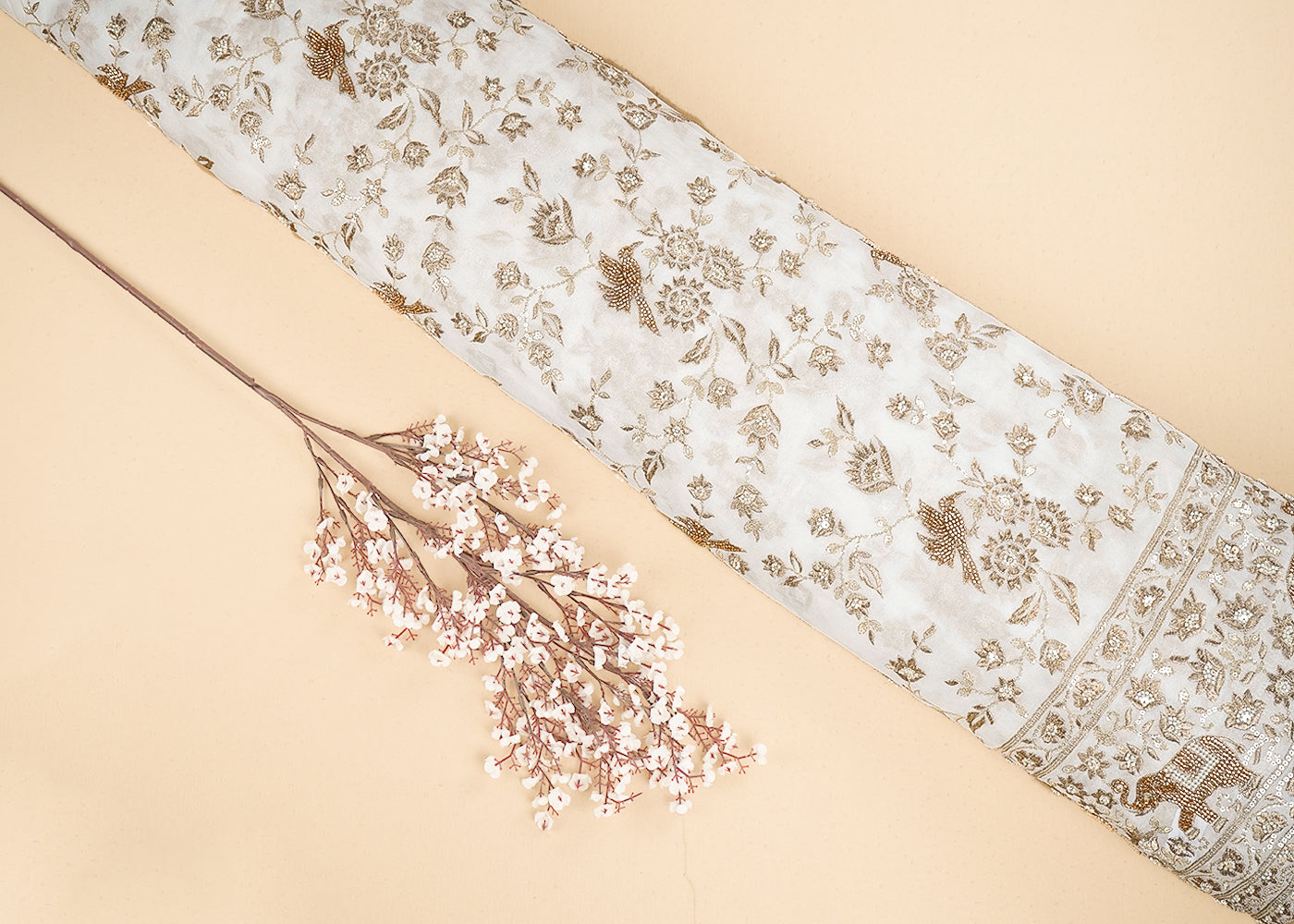 White Georgette Fabric With All Over Bird Motif Of Zari, Sequins, Katdana And Bead Work With One Side Elephant Motif Border 19989