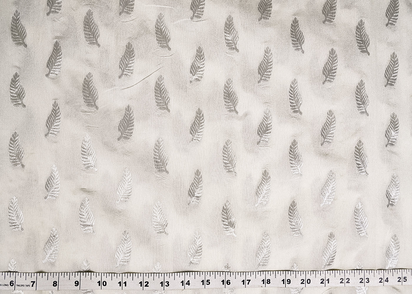 White Dyeable Chanderi Fabric With All Over Leaf Buti Of Silver Zari Handloom 20400