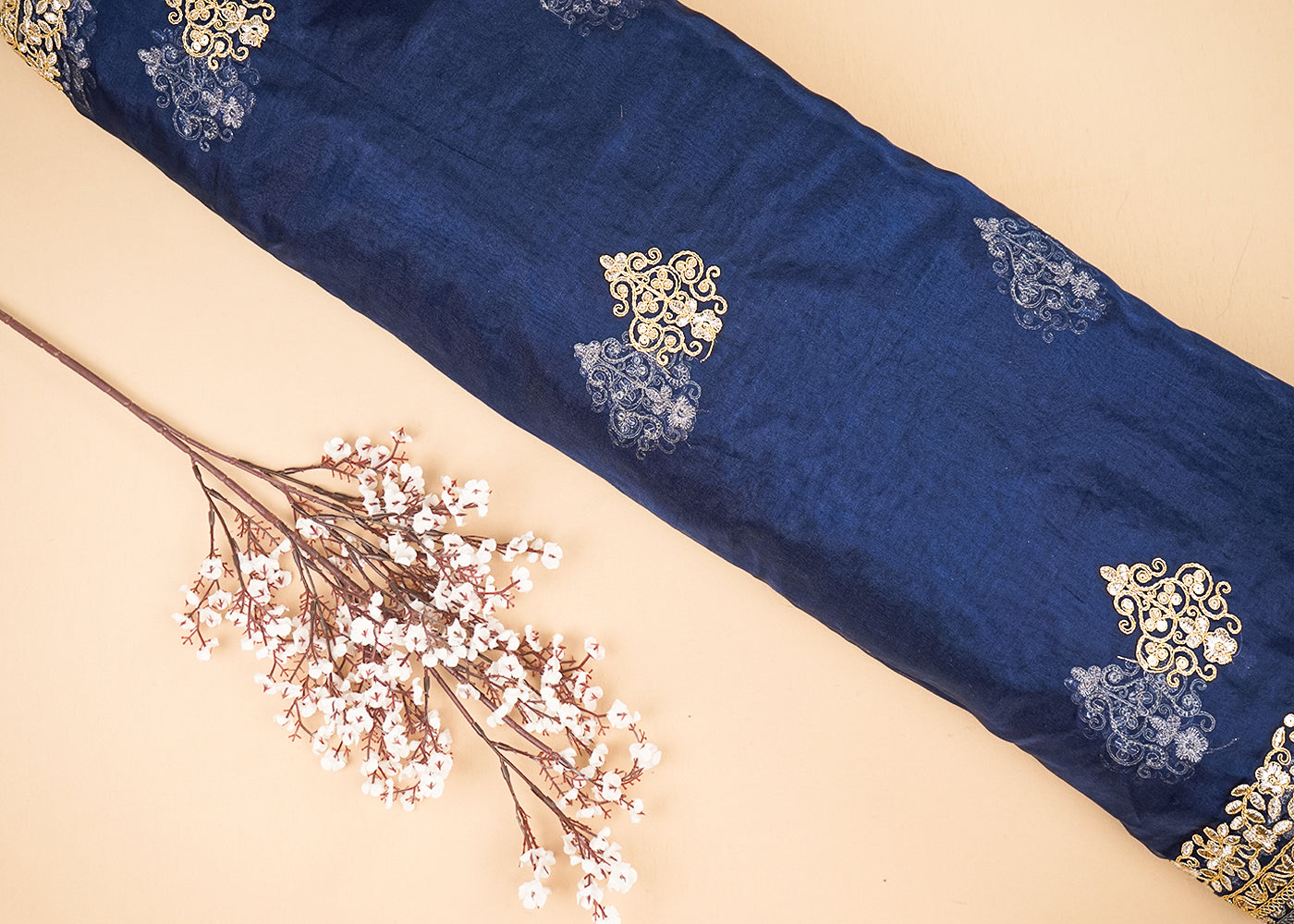 Navy Blue Organza Fabric With All Over Buti Of Golden Zari And Sequins With Two Side Border 20536