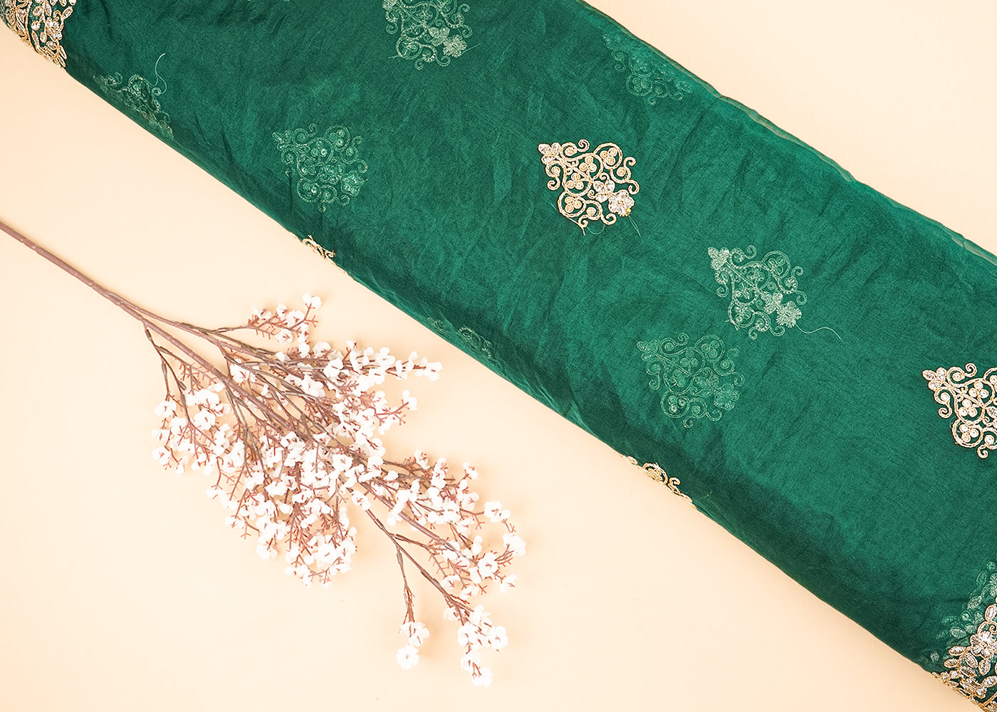 Bottle Green Organza Fabric With All Over Buti Of Golden Zari And Sequins With Two Side Border 20539