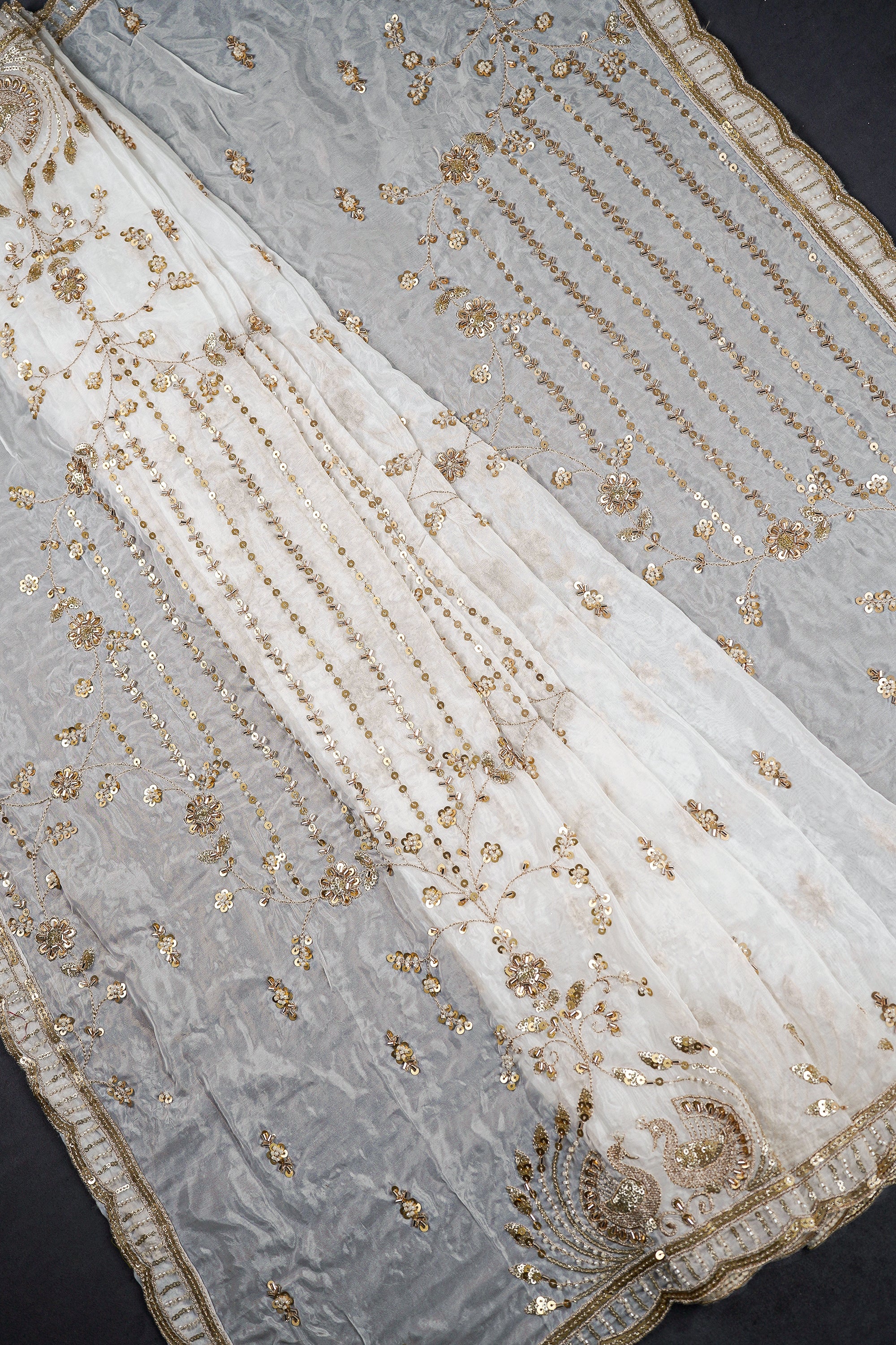 white-organza-dupatta-with-all-over-sequins-bead-katdana-and-zari-work-20593-pleats-view