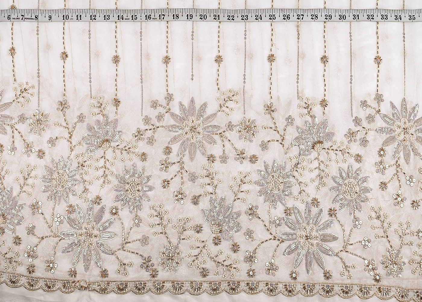 White Georgette Fabric With All Over Katdana, Zari, Bead And Sequins Work With One Side Border 20860