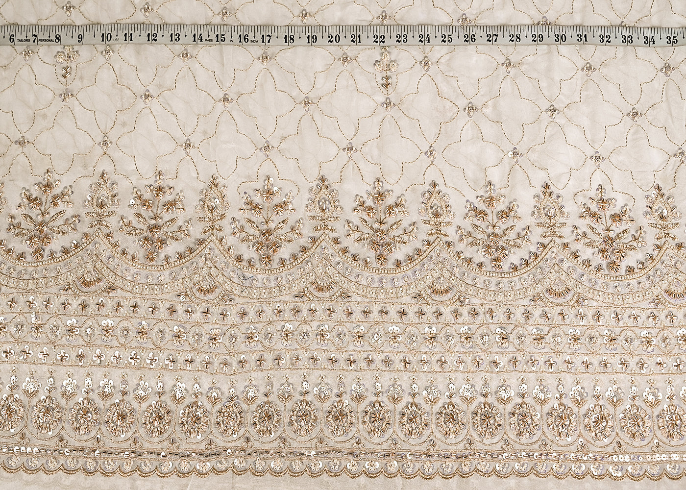 White Georgette Fabric With All Over Katdana, Zari, Bead And Sequins Work With One Side Border 20971