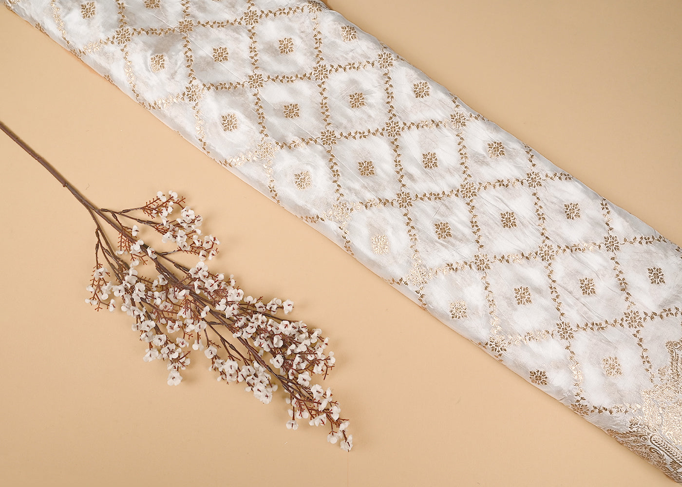 White Crepe Fabric with Allover Zaal Pattern of Golden Zari with One Side Heavy Border 20989