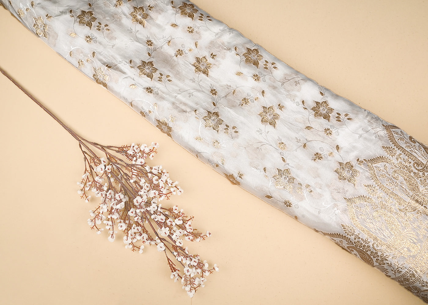 White Crepe Fabric with Allover Floral Pattern of Golden Zari Handloom with One Side Heavy Border 20992