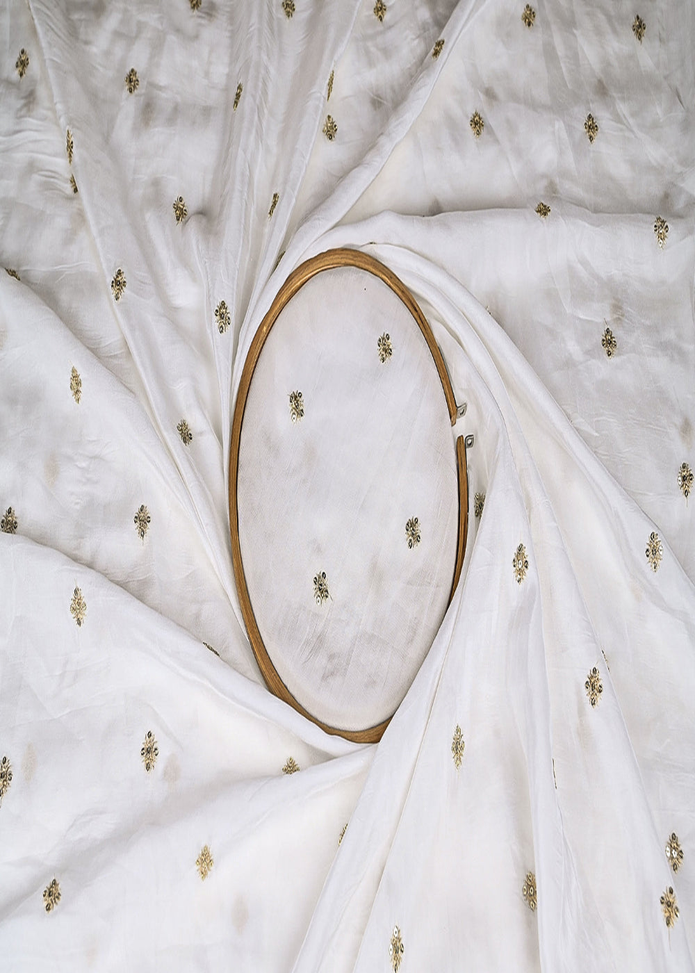 White-Dyeable-Crepe-Fabric-With-All-Over-Buti-Of-Sequins-And-Zari-Work-21080-close-view