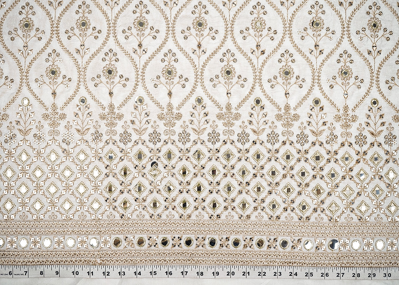 White Dyeable Silk Fabric With All Over Zari, Faux Mirror And Sequins Work With One Side Border 21587