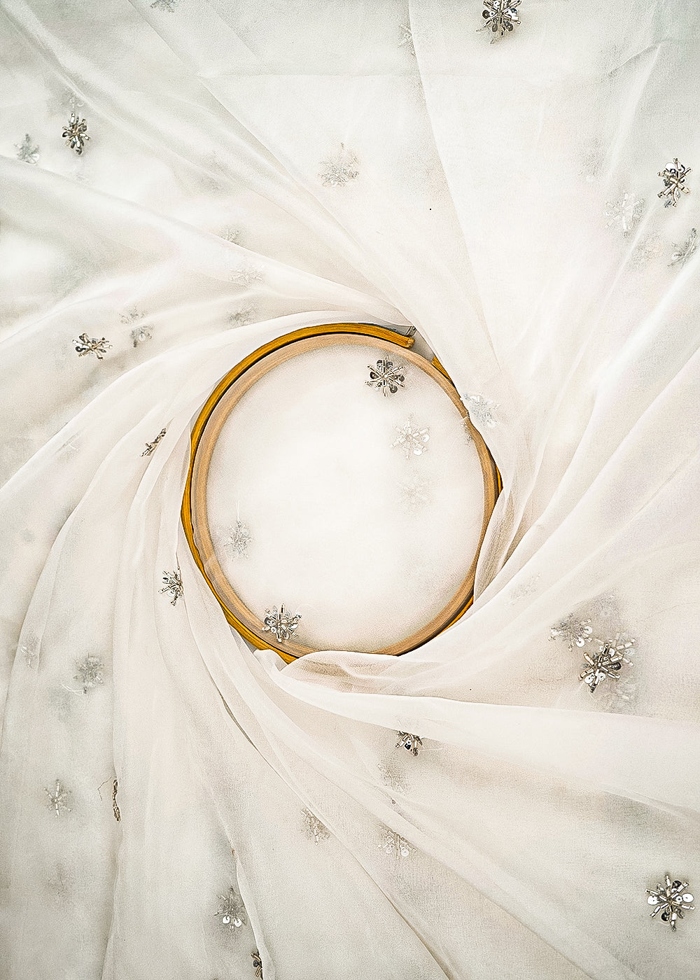 White-Dyeable-Organza-Fabric-With-All-Over-Buti-Of-Sequins-And-Katdana-Work-21592-close-view