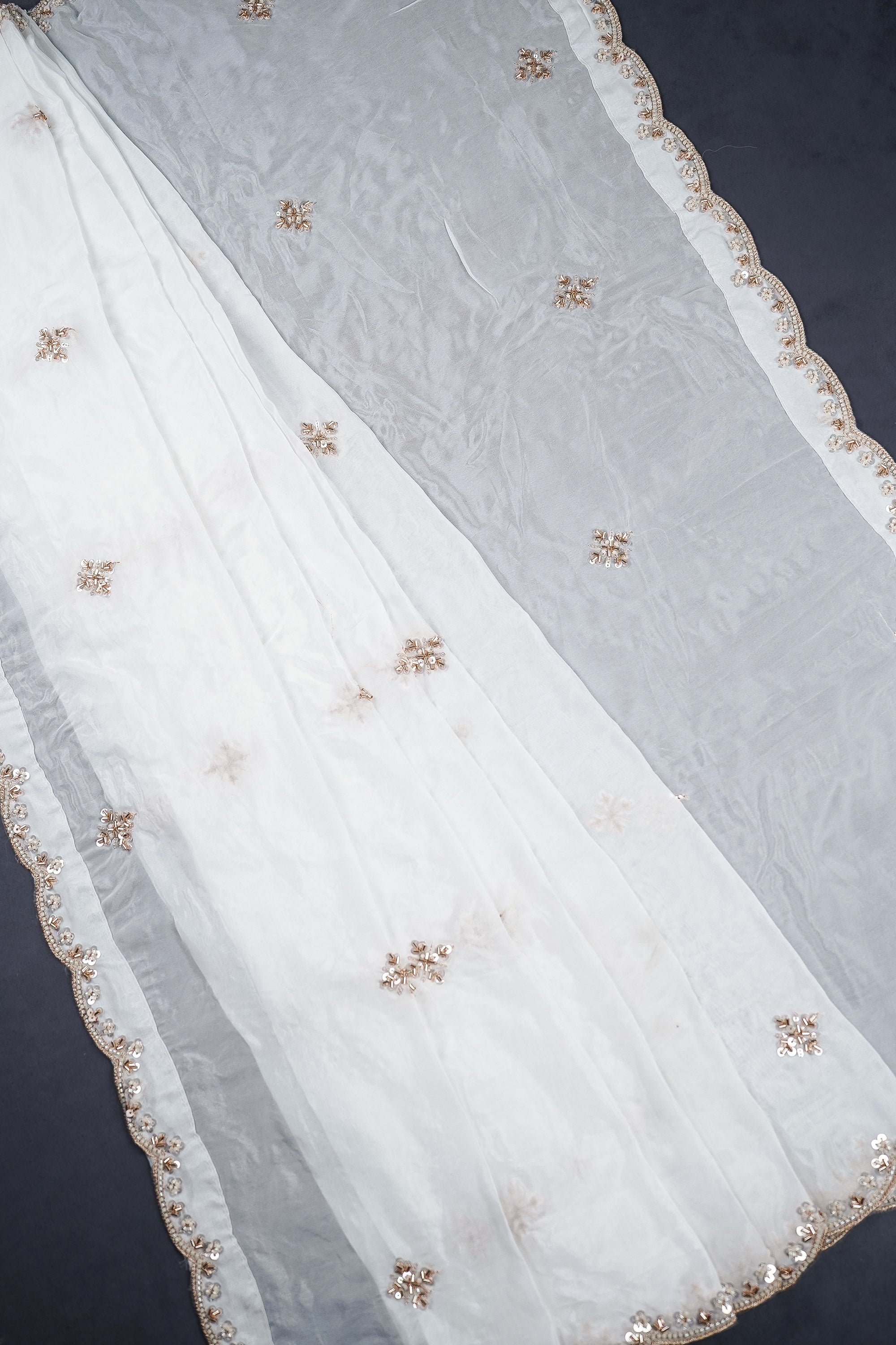 white-organza-dupatta-with-all-over-bead-katdana-sequins-and-zari-work-with-scalloped-border-22366-pleats-view