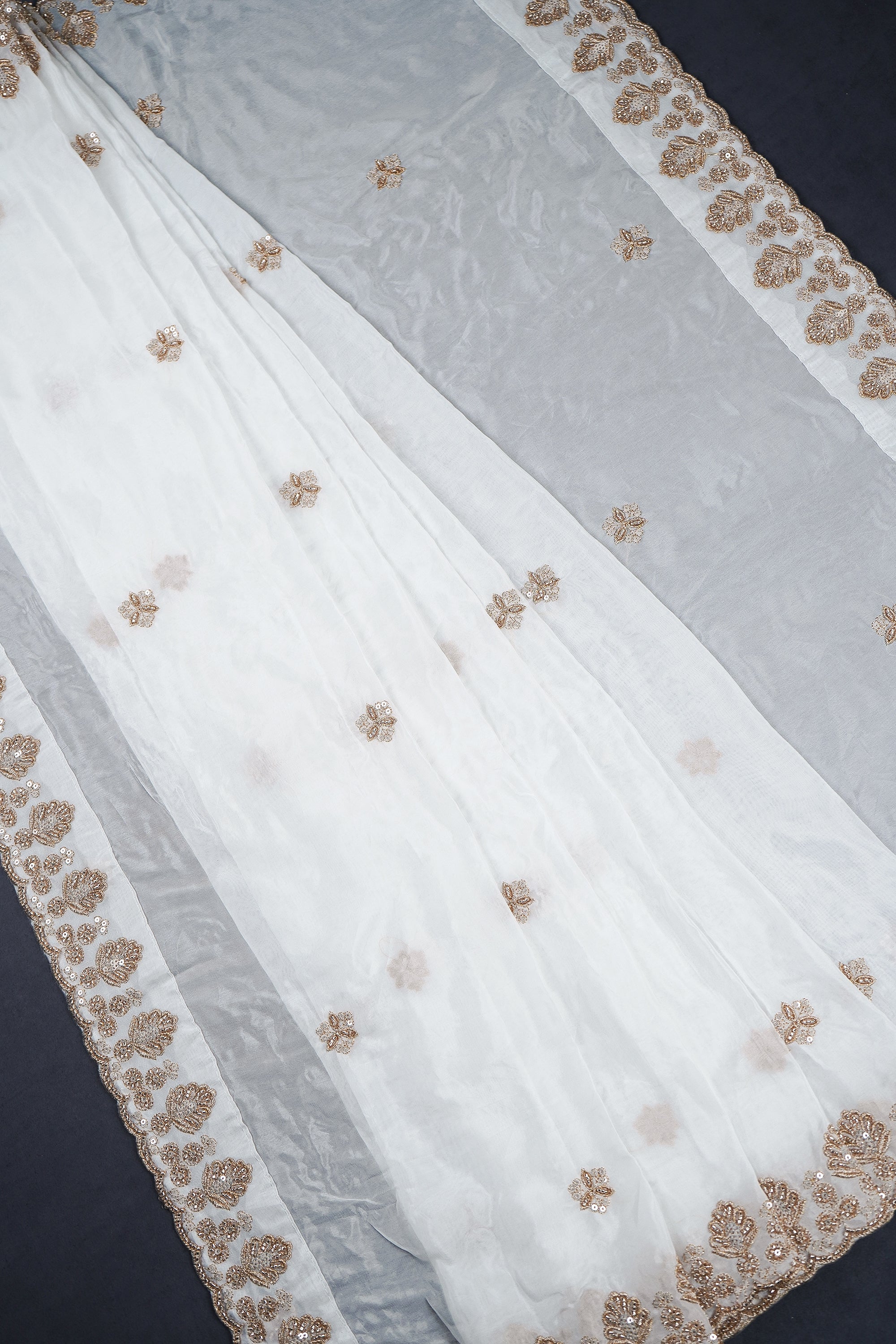 white-organza-dupatta-with-all-over-zari-sequins-and-bead-work-with-scalloped-borders-22368-pleats-view