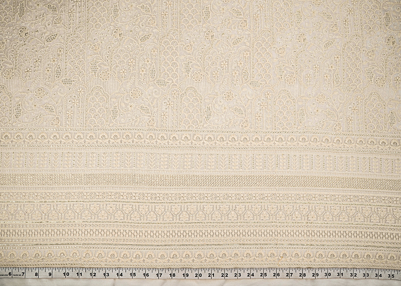 White Dyeable Georgette Fabric With All Over Thread And Sequins Work With One Side Border 22380