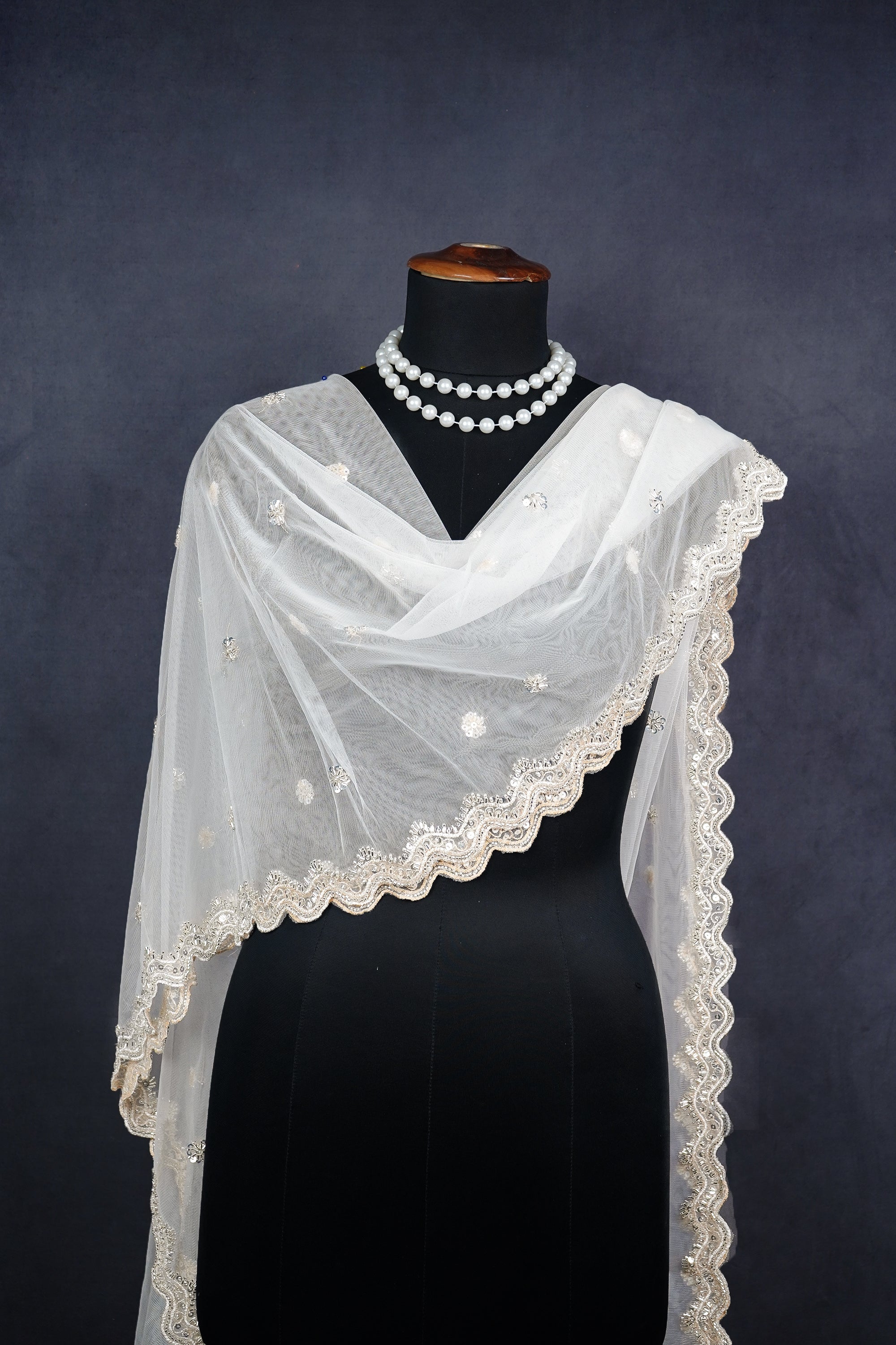 white-net-dupatta-with-all-over-katdana-sequins-and-bead-work-with-scalloped-borders-22522-real-view