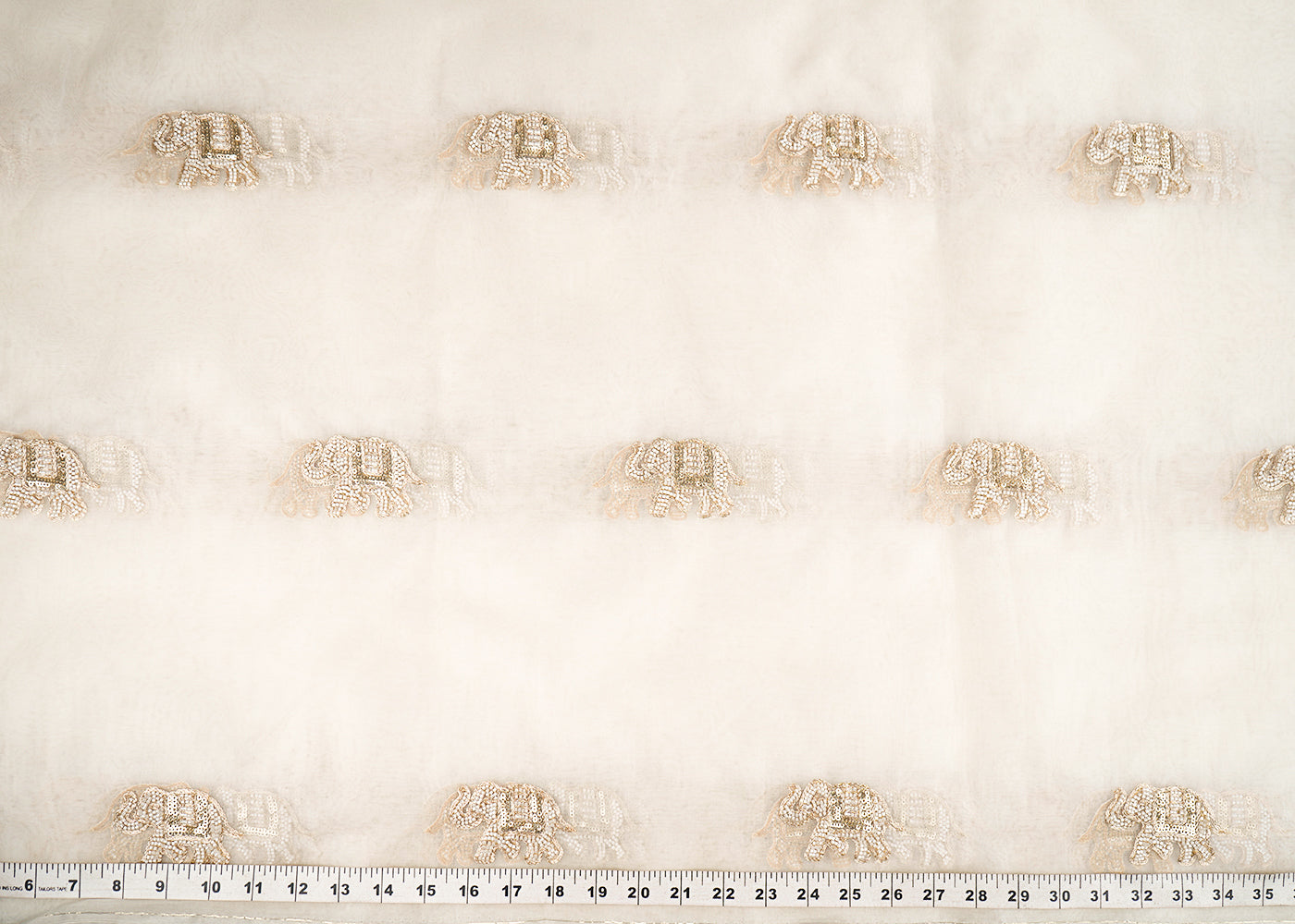 White Dyeable Pure Organza Fabric With All Over Elephant Motif Of Zari, Katdana, And Bead Work 22702