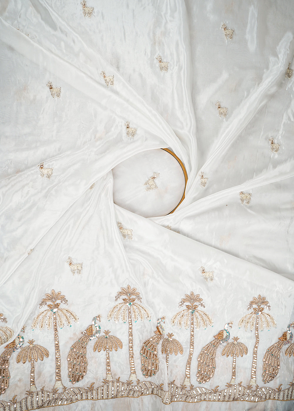 White Dyeable Silk Fabric With All Over Buti Of Zari, Sequins, Katdana & Bead Work With One Side Peacock Border 22764