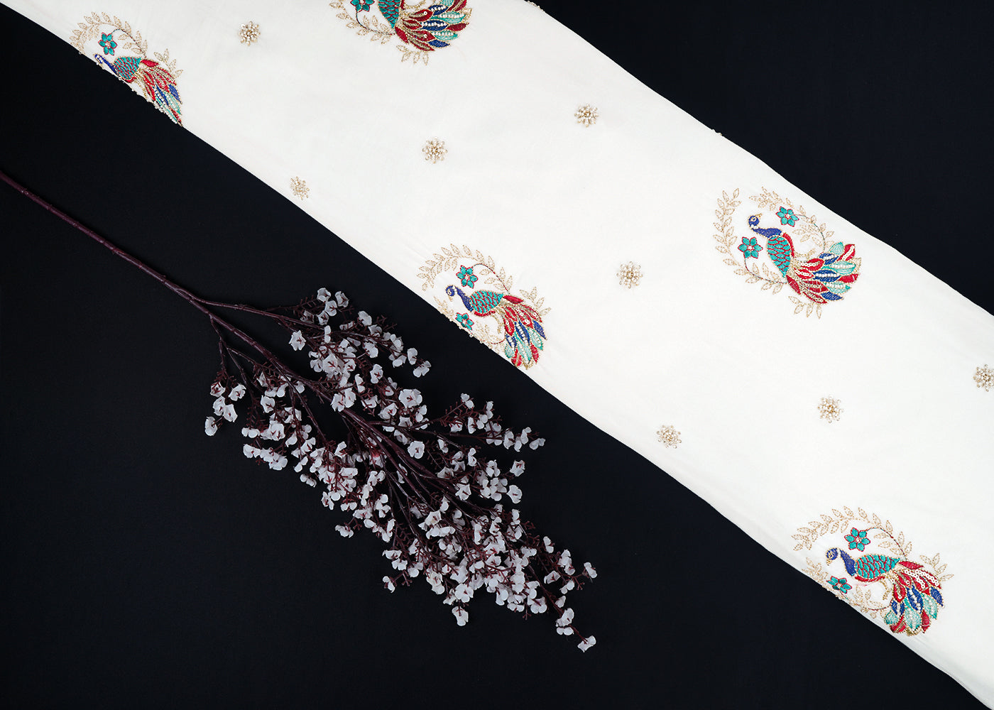 White Dyeable Muslin Cotton Fabric With All Over Peacock Motif Of Zari, Sequins And Katdana Work 22767