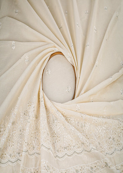 Off White Dyeable Kora Cotton Fabric With All Over Buti Of Thread, Zari, Sequins And Katdana Work With One Side Scalloped Border 22773